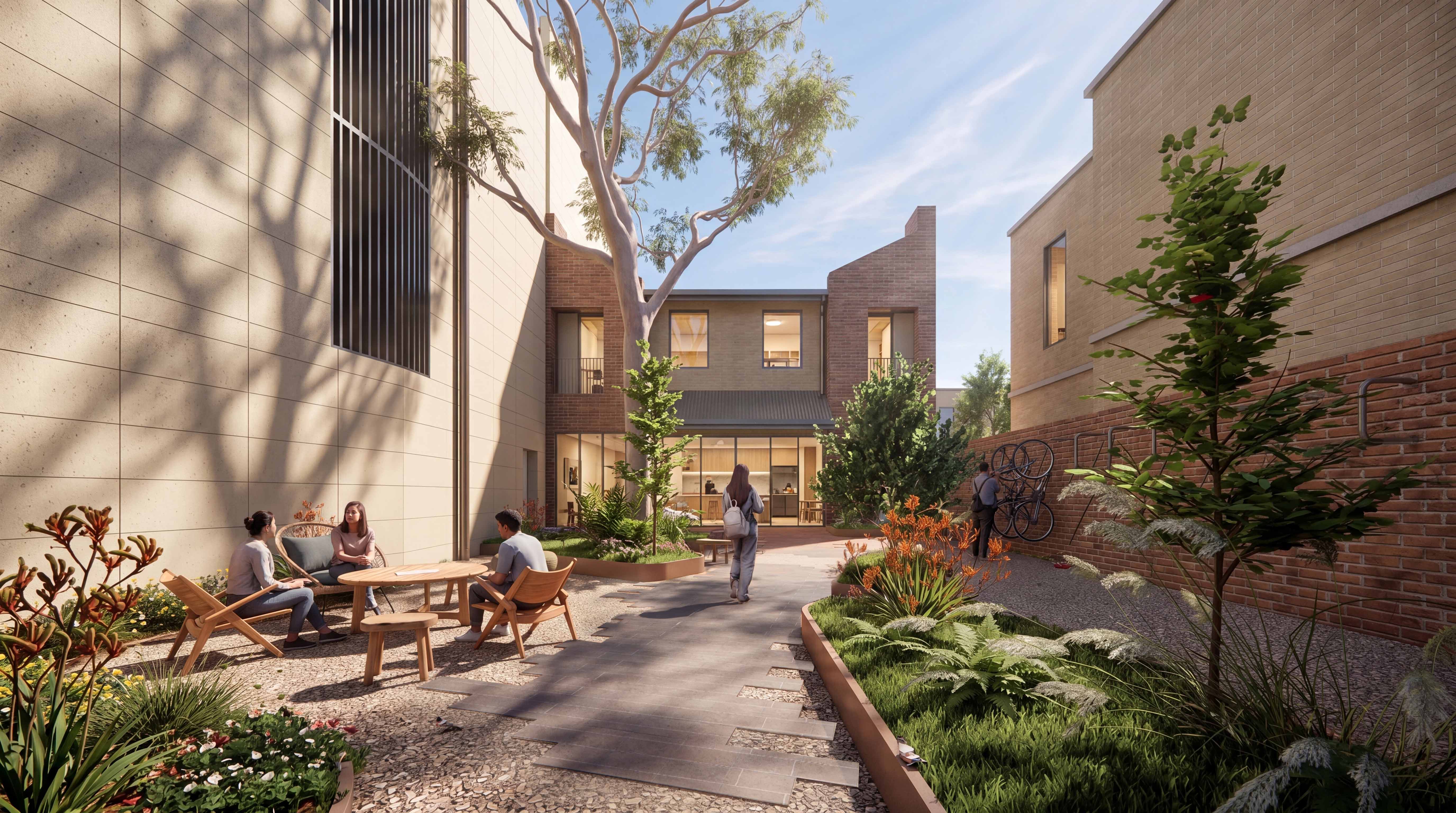 The Arundel landscaped courtyard visualisation, framed by brick architecture and outdoor seating